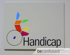 The handicap toilet sign at Biopolis buildings.