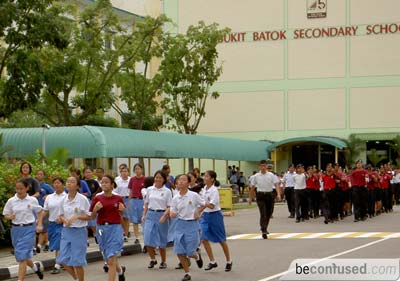Image of my secondary school with the uniform group members. Faces have undergone some sort of bluration to ensure they aren't recognizable.